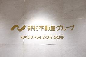 Nomura Real Estate signboard and logo